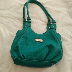 handbag has a zippers insade